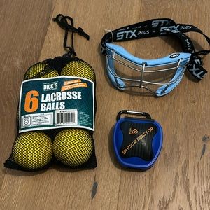 Women’s lacrosse eyewear, six lacrosse balls, and one mouthguard case.